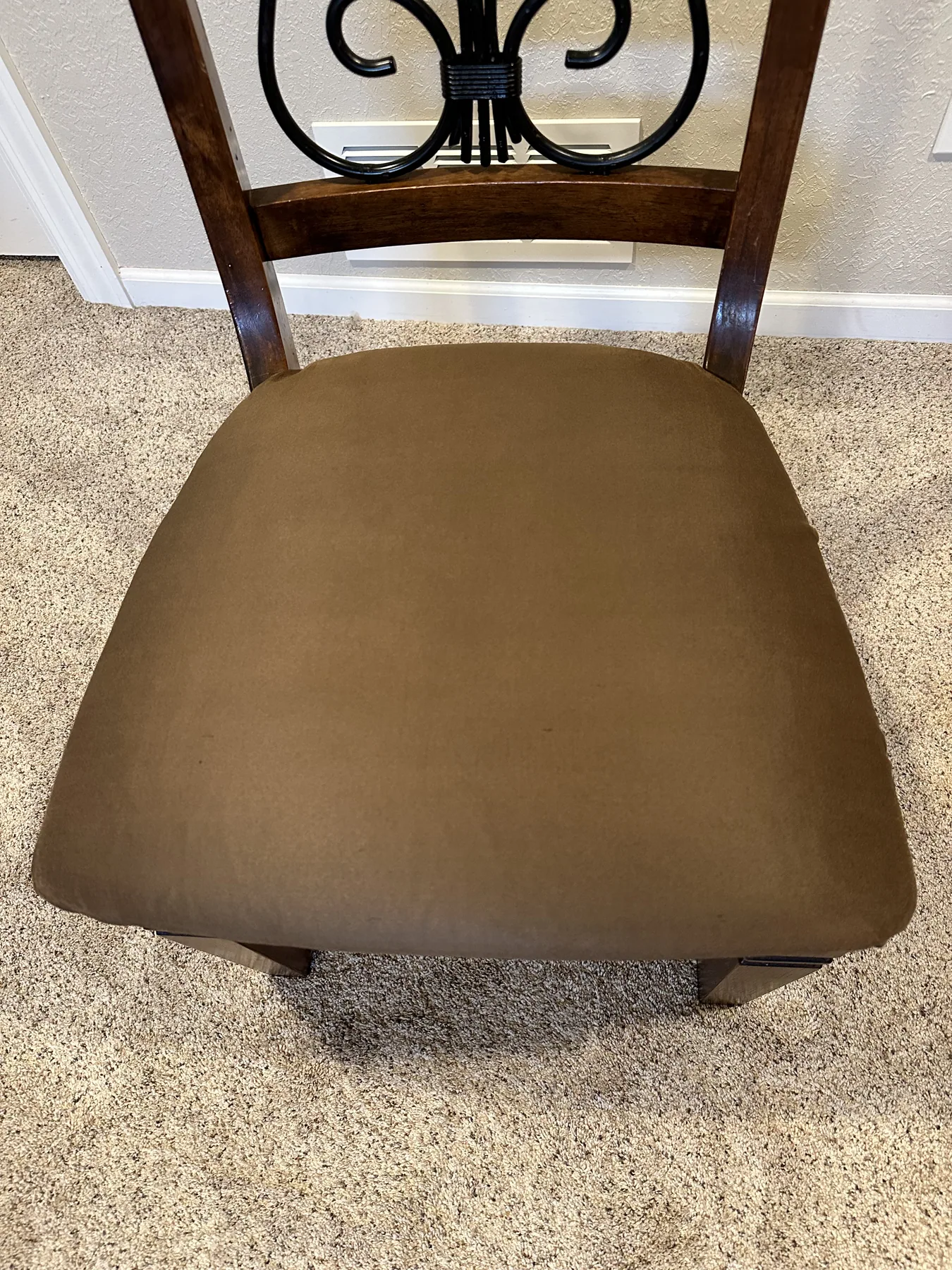 Same dining chair seat cushion clean and even in color after dry cleaning